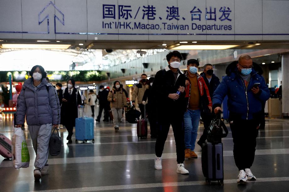 Voyageurs à l'aéroport international de Pékin (Reuters/fichier)